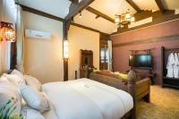 Big Tree Guesthouse - Naxi old styleにあるベッド