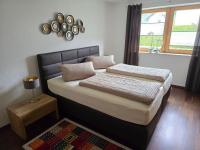A bed or beds in a room at Ferienhaus Fießmann