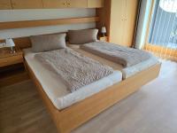 A bed or beds in a room at Ferienhaus Fießmann