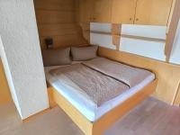 A bed or beds in a room at Ferienhaus Fießmann