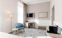 TV a/nebo společenská místnost v ubytování Grandhotel Brno
