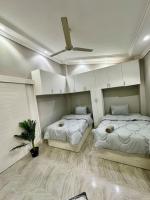Postel nebo postele na pokoji v ubytování 2Bedrooms Penthouse's-New Cairo
