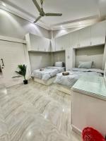 Postel nebo postele na pokoji v ubytování 2Bedrooms Penthouse's-New Cairo