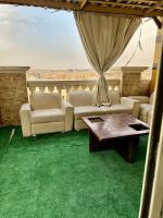 Posezení v ubytování 2Bedrooms Penthouse's-New Cairo