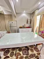 Kuchyň nebo kuchyňský kout v ubytování 2Bedrooms Penthouse's-New Cairo