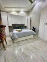Postel nebo postele na pokoji v ubytování 2Bedrooms Penthouse's-New Cairo