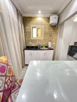 Kuchyň nebo kuchyňský kout v ubytování 2Bedrooms Penthouse's-New Cairo