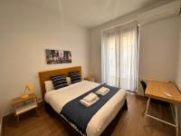 Postel nebo postele na pokoji v ubytování Amazing 3BD 3BTH with 9 Balconies by Madrid4You Apartments