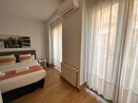 Postel nebo postele na pokoji v ubytování Amazing 3BD 3BTH with 9 Balconies by Madrid4You Apartments