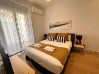 Postel nebo postele na pokoji v ubytování Amazing 3BD 3BTH with 9 Balconies by Madrid4You Apartments