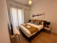 Postel nebo postele na pokoji v ubytování Amazing 3BD 3BTH with 9 Balconies by Madrid4You Apartments