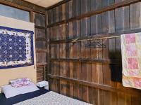Postel nebo postele na pokoji v ubytování HostelBed and Retreat Phitsanulok