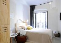 Postel nebo postele na pokoji v ubytování The Hat Madrid