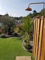 Vonkajšia záhrada v ubytovaní Dune Blanche 300 m de l'Océan, appartement neuf 6 personnes