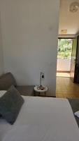 Posteľ alebo postele v izbe v ubytovaní Room accomodation Jezera Lovišća