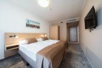 Łóżko lub łóżka w pokoju w obiekcie Hotel Ehrlich Prague