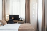 Łóżko lub łóżka w pokoju w obiekcie Hotel Ehrlich Prague