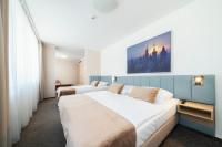Łóżko lub łóżka w pokoju w obiekcie Hotel Ehrlich Prague