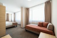 Łóżko lub łóżka w pokoju w obiekcie Hotel Ehrlich Prague