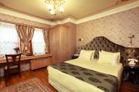 Un pat sau paturi &icirc;ntr-o camer&#x103; la Dersaadet Hotel Istanbul
