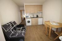 Kuchyň nebo kuchyňský kout v ubytování appartement situé a 100 m de la plage