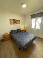 Postel nebo postele na pokoji v ubytování appartement situé a 100 m de la plage
