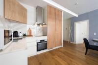 Kuchyň nebo kuchyňský kout v ubytování Contemporary Flat near São Bento by LovelyStay