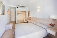 Postel nebo postele na pokoji v ubytování Hotel San Miguel