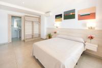 Postel nebo postele na pokoji v ubytování Hotel San Miguel
