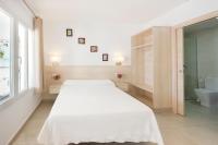 Postel nebo postele na pokoji v ubytování Hotel San Miguel