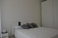 Posteľ alebo postele v izbe v ubytovaní Alba Apartment - Villaggio di Mary