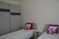 Posteľ alebo postele v izbe v ubytovaní Alba Apartment - Villaggio di Mary