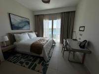 Postel nebo postele na pokoji v ubytování Vida Marina Resort Marassi