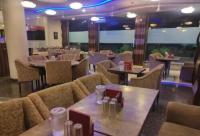 Restaurace v ubytování SAIBABA INTERNATIONAL SUPREME Hotel