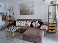 Posezení v ubytování Apartamento con jardín y piscina Pet friendly