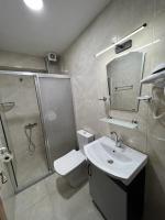 Koupelna v ubytování Retrol Hotel