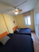 Postel nebo postele na pokoji v ubytování Apartamento a 2 minutos andando a la playa.