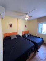 Postel nebo postele na pokoji v ubytování Apartamento a 2 minutos andando a la playa.