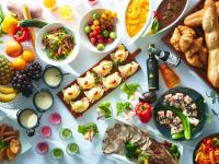 a table topped with lots of different types of food at Lotte City Hotel Kinshicho in Tokyo