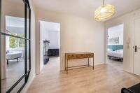 Postel nebo postele na pokoji v ubytování BeBarceloner Eixample Apartments- 4 bedrooms