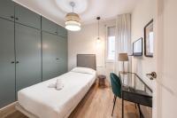 Postel nebo postele na pokoji v ubytování BeBarceloner Eixample Apartments- 4 bedrooms