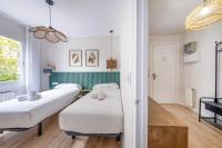 Postel nebo postele na pokoji v ubytování BeBarceloner Eixample Apartments- 4 bedrooms