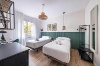 Postel nebo postele na pokoji v ubytování BeBarceloner Eixample Apartments- 4 bedrooms