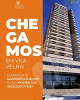 Un volante para el CMA MOC y un edificio alto. en Quality Suites Vila Velha, en Vila Velha
