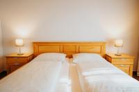 Postel nebo postele na pokoji v ubytování Hotel Leo