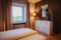 Postel nebo postele na pokoji v ubytování Hotel Leo