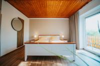 Postel nebo postele na pokoji v ubytování Hotel Leo
