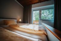 Postel nebo postele na pokoji v ubytování Hotel Leo