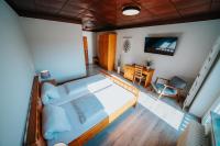 Postel nebo postele na pokoji v ubytování Hotel Leo