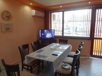 TV a/nebo společenská místnost v ubytování Guest House Karaulanov